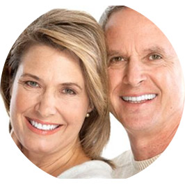 A couple of mature people showing bright beautiful teeth. Dental restoration is suitable for all ages!