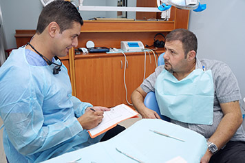A picture of a male patient speaking with our doctor